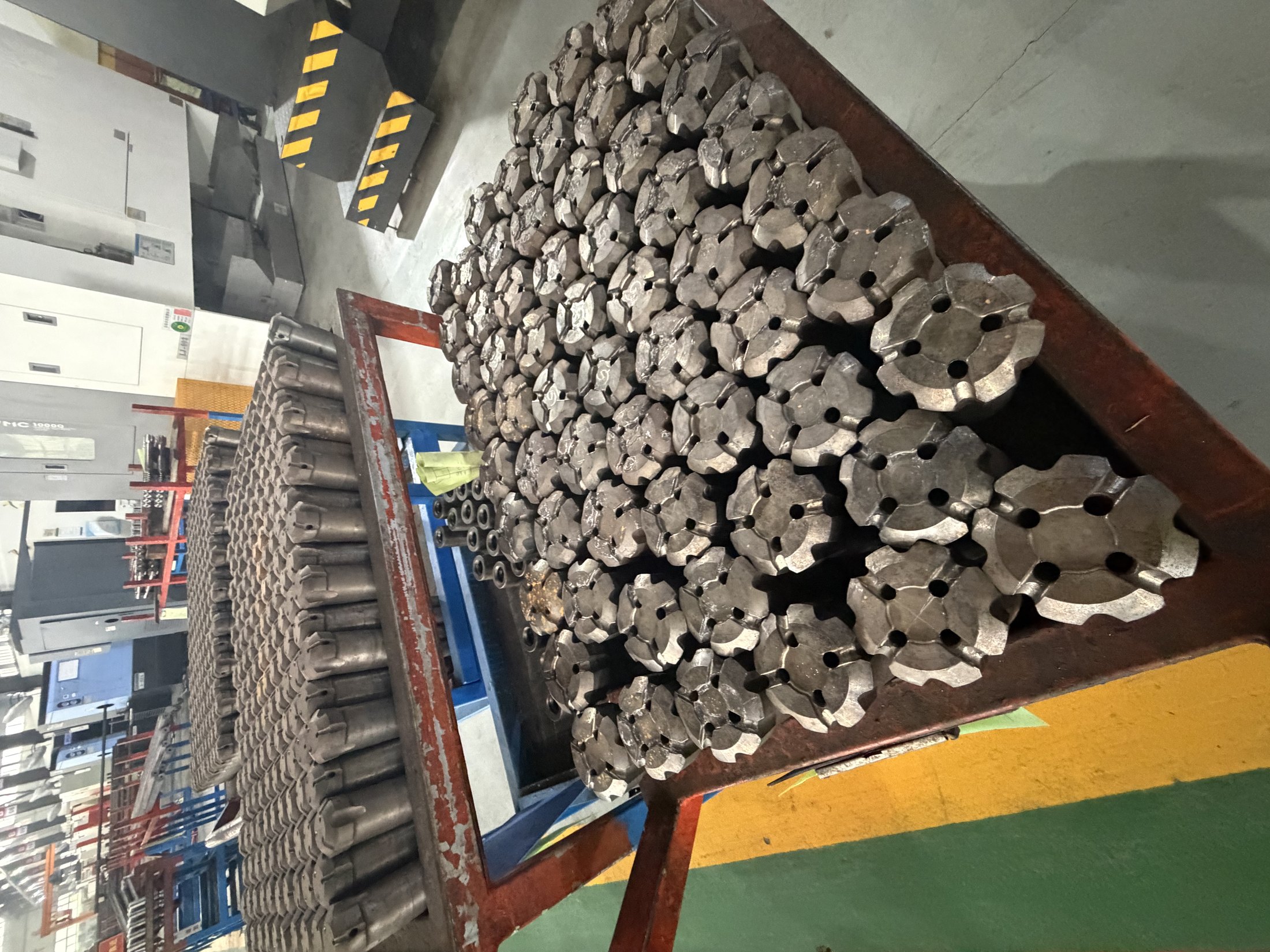 Cutting pick production line with CNC machines