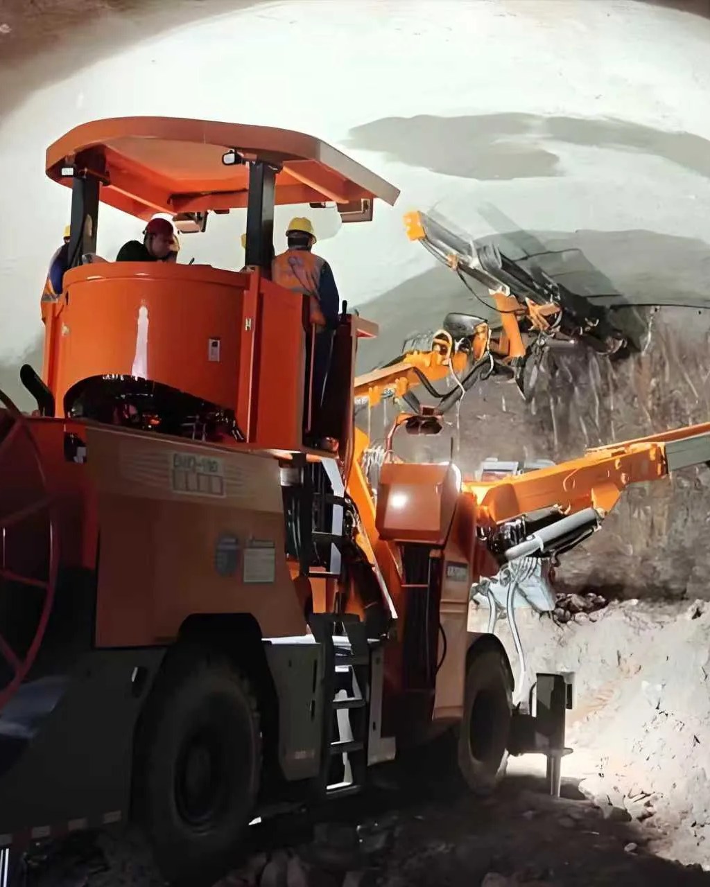 Roadheader cutting tools working inside a rock tunnel