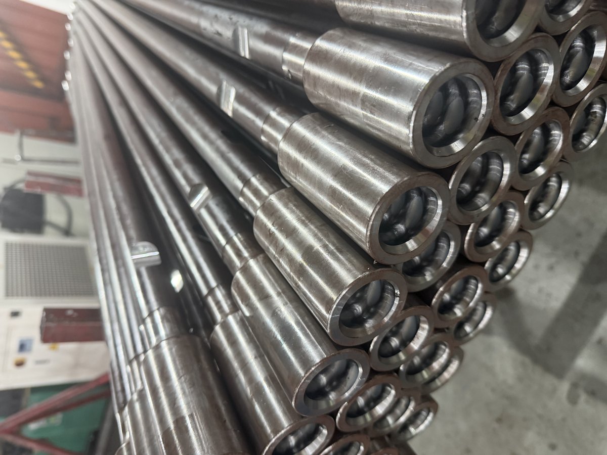 Drill rods racked in storage