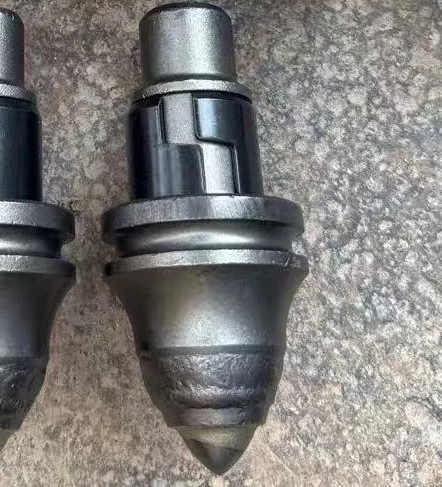 PLASMA pick after service — carbide tip intact